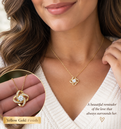 Illustrative lifestyle image showing a model wearing a yellow-gold Love Knot-style necklace; actual product details shown in product gallery